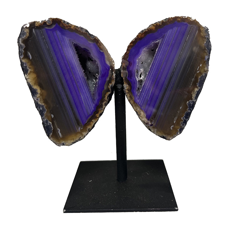 Géode d'agate teintée violet en paire sur socle